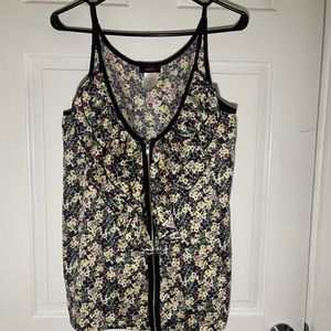 This cute flower printed shirt is sure to brighten your day!